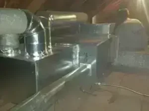 Newly installed high-efficiency furnace system in attic with clean ductwork, showing quality HVAC installation and professional heating service